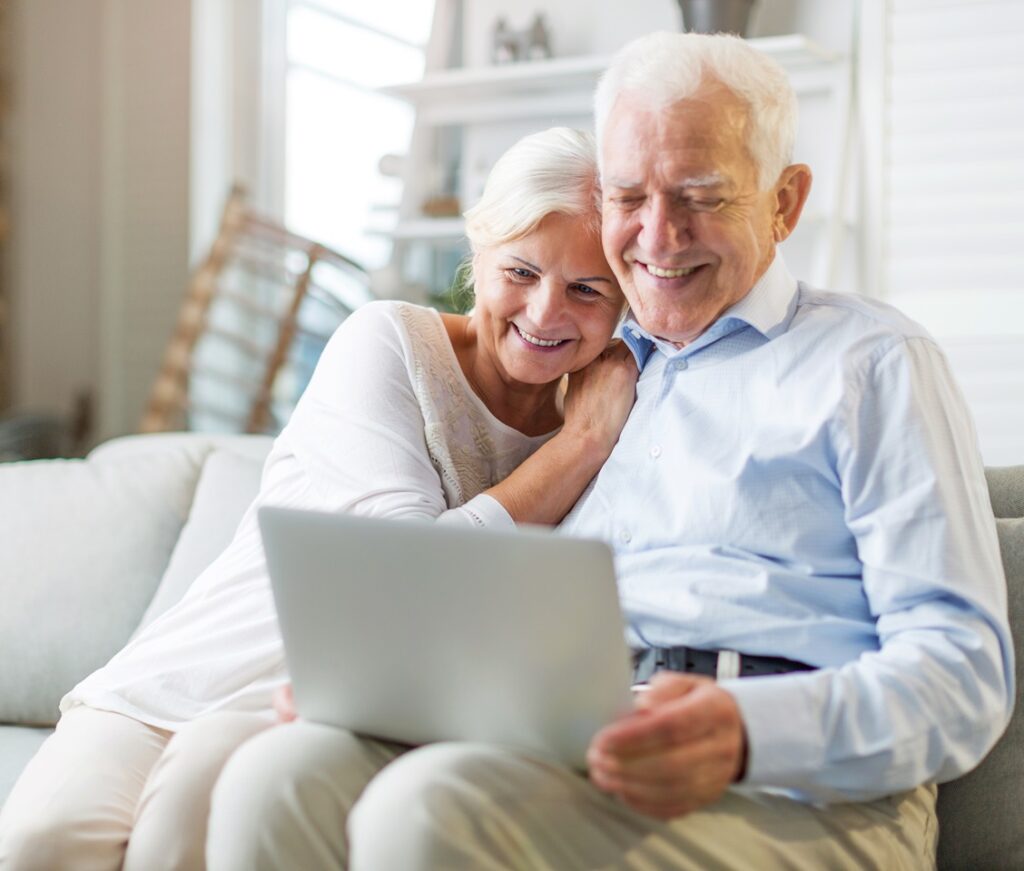 Senior couple using laptop with senior living wifi - Datavalet - Datavalet